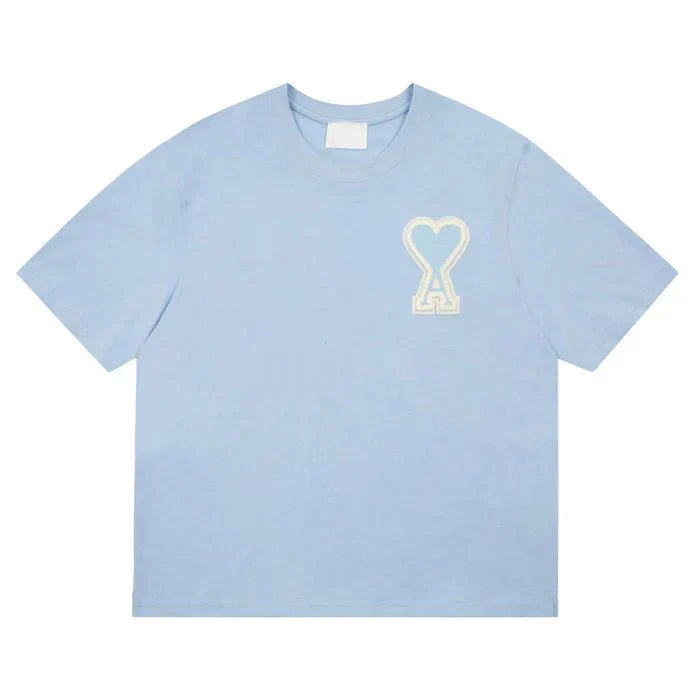 https://cdn.shopify.com/s/files/1/0901/0413/6028/files/ami-heart-tee-951907.webp?v=1743324147